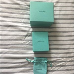 Bundle of Tiffany boxes and pouches.